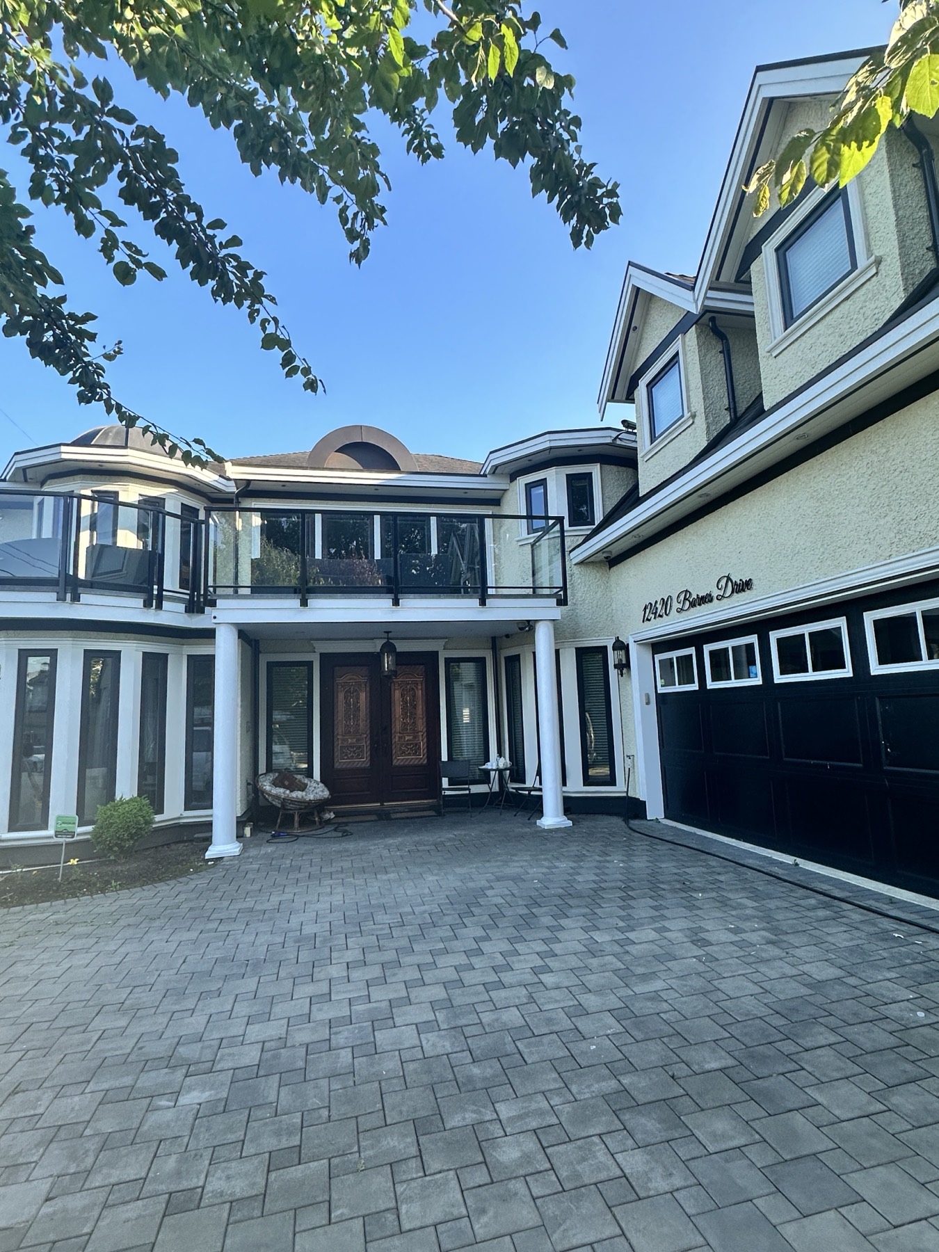 A large home painted in deep charcoal