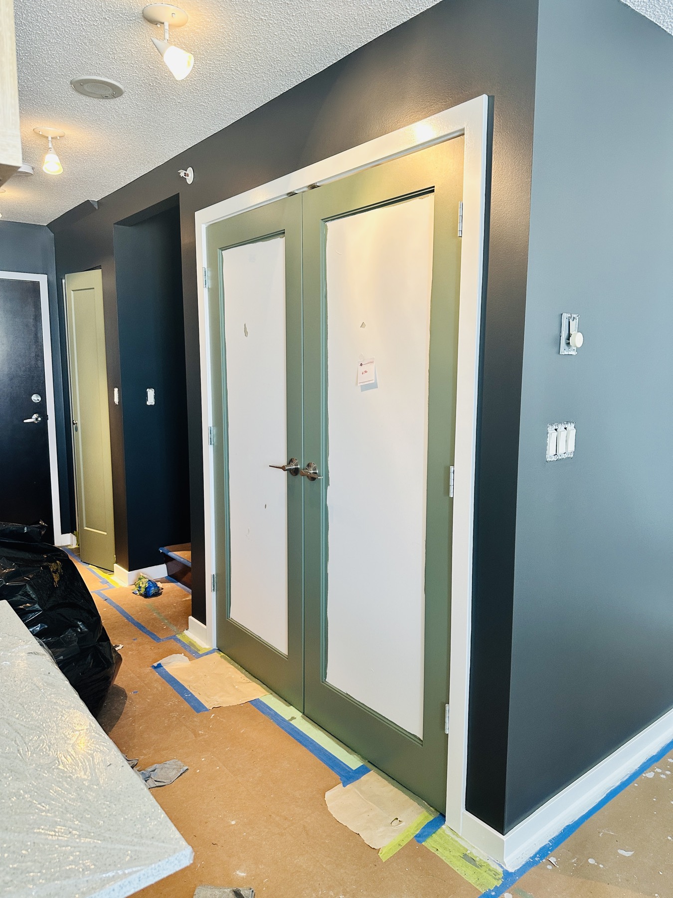 A door being cut in during an interior repaint